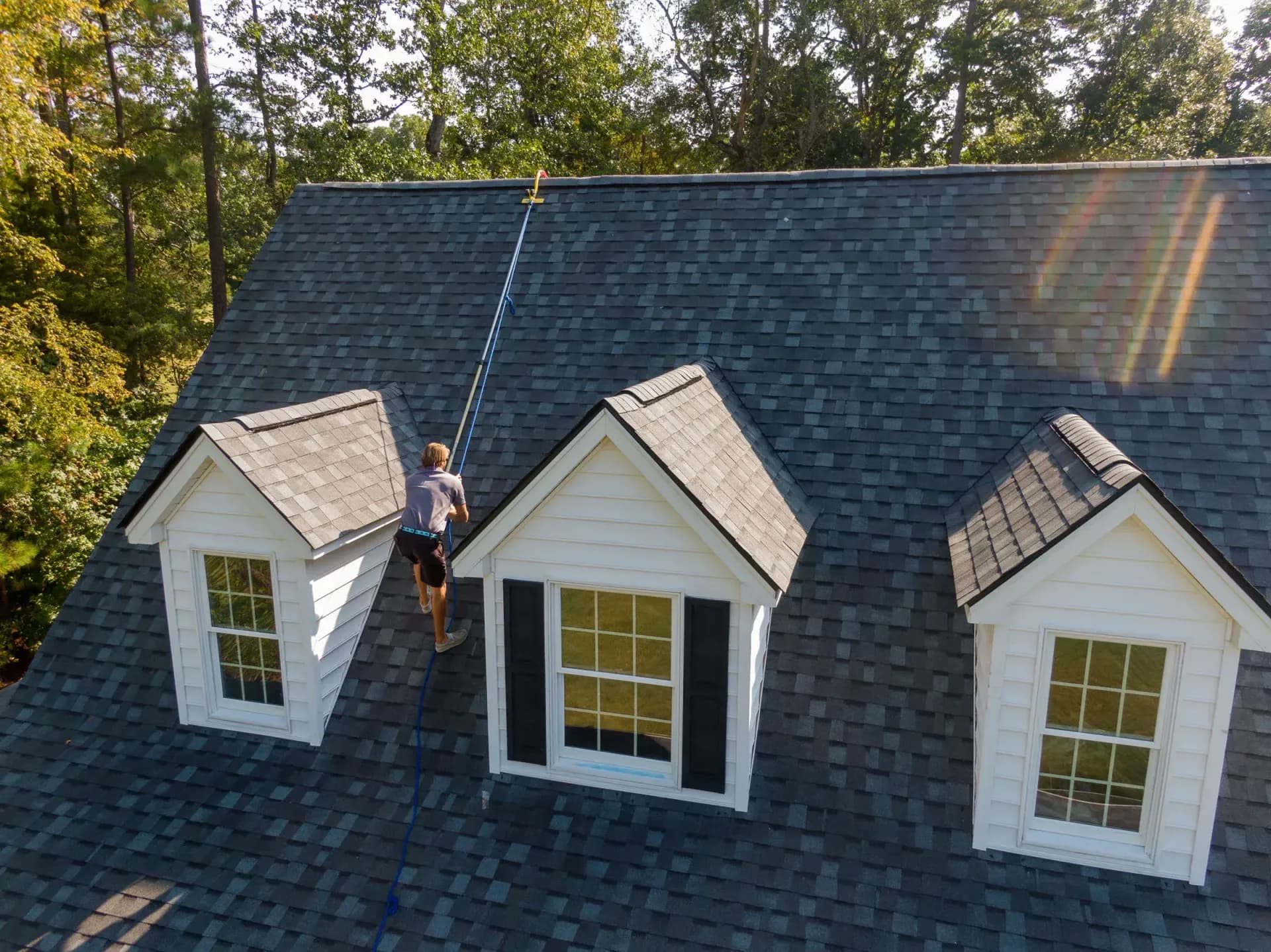 Home being inspected by roofing expert